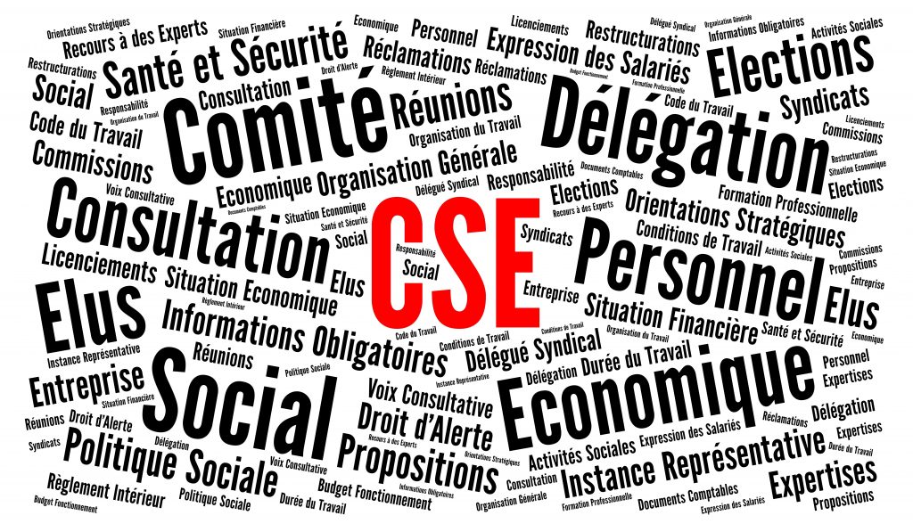 Élus de CSE analysant les documents économiques de leur entreprise