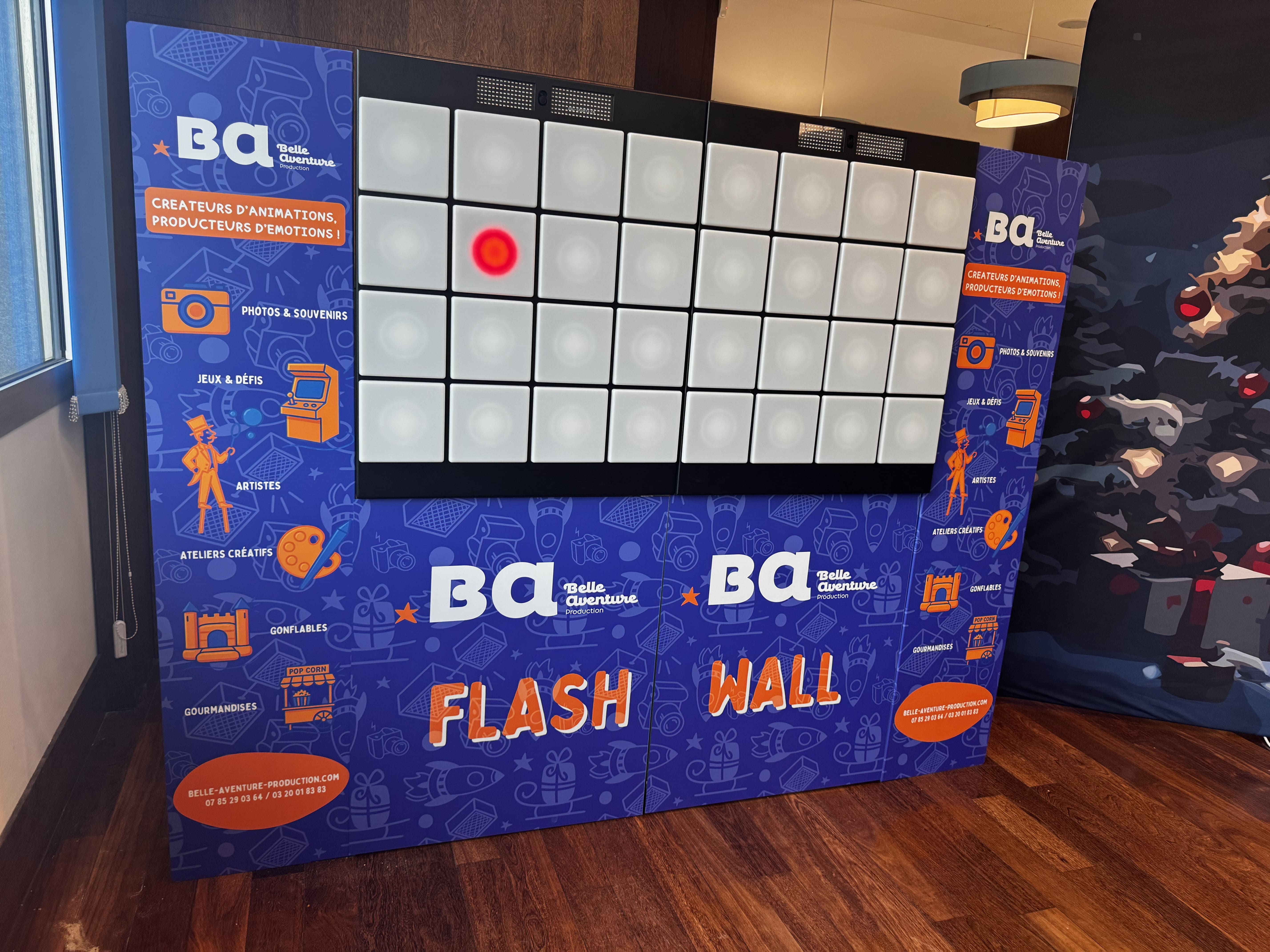 Mur de jeux interactif animant un arbre de Noël d'entreprise